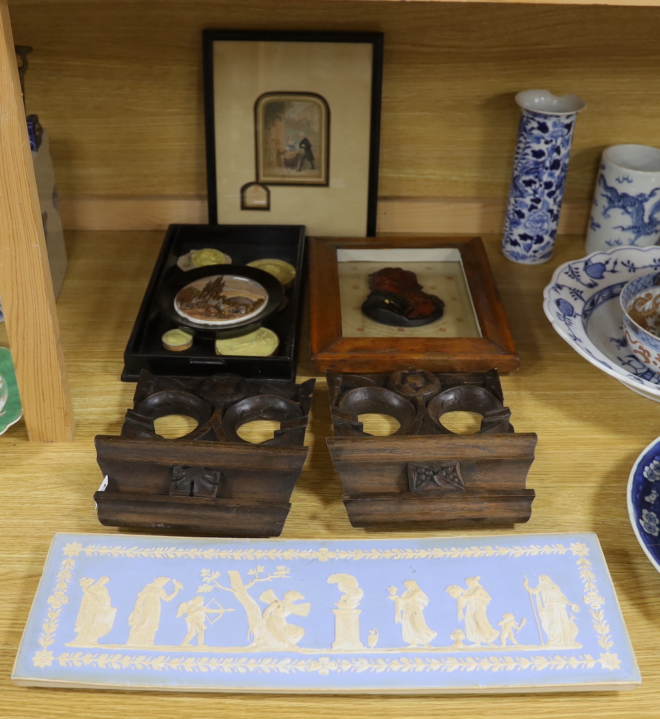 A group of Object d'Art to include Grand tour souvenir plaster roundels, a wax profile portrait, pair of carved oak cornice sections, a moulded plaster frieze etc